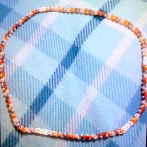 This is a long necklace, as you can see in the 3rd photo I made it a bracelet.